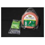 Collection of Lawn and Garden Supplies Including Hose, Mulch Film, Extension Cord, and Accessories