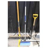 Collection of Yard and Snow Tools with Shovels, Brooms, Rake, and Snow Pusher