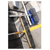 Collection of Yard and Snow Tools with Shovels, Brooms, Rake, and Snow Pusher