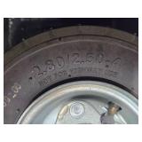 Lot of (2) 8" Caster Wheels - (1) Rigid and (1) Swivel