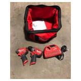 Set of Milwaukee  12V cordless Drills with Charger  no batteries used not tested Customer Returns See Pictures
