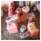 Gas Can Lot with a pair of Car Ramps