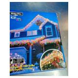 2 Boxes, Holiday branded 300-count multi-color incandescent icicle lights with white wire.