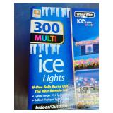 2 Boxes, Holiday branded 300-count multi-color incandescent icicle lights with white wire.
