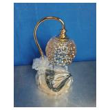  Pearl Candle Warmer Lamp with a gold-tone arch and a glass shade with a dimpled or bubble texture.