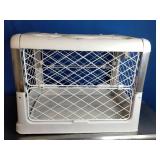 Diggs Revol collapsible dog crate.