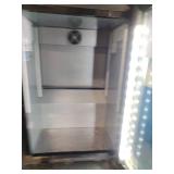 Countertop Pepsi display refrigerator.