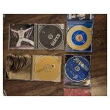 collection of Elvis Presley music CDs, which are collectible items.