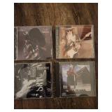 4 Stevie Ray Vaughan and Double Trouble CDs.