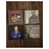 4 Eric Clapton music CDs.