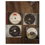 4 Eric Clapton music CDs.