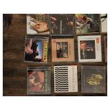 Collection of 25 rock music CDs, which are considered collectibles.