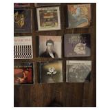 Collection of 25 rock music CDs, which are considered collectibles.