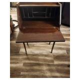 Antique slant-top desk, also known as a secretary desk or bureau.