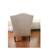 Pair of Upholstered Wingback Chairs with Matching Ottomans