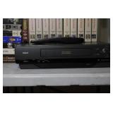 RCA VHS VCR with Remote, User Guide, and 24 Movie VHS Tapes Lot