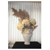 Large Decorative Vase with Face Motif and Dried Floral Arrangement