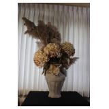 Large Decorative Vase with Face Motif and Dried Floral Arrangement