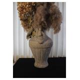 Large Decorative Vase with Face Motif and Dried Floral Arrangement