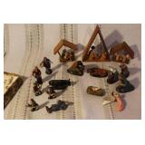 Collection of Vintage Nativity Figurines and Wooden Creches
