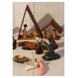 Collection of Vintage Nativity Figurines and Wooden Creches