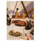 Collection of Vintage Nativity Figurines and Wooden Creches