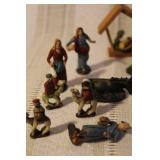 Collection of Vintage Nativity Figurines and Wooden Creches