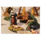 Collection of Vintage Nativity Figurines and Wooden Creches