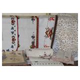 Collection of Vintage Table Linens, Placemats, and Runners with Embroidery and Woven Designs