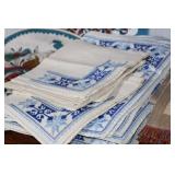 Collection of Vintage Table Linens, Placemats, and Runners with Embroidery and Woven Designs