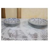 Collection of Blue and White Porcelain Tea Cups and Plates with Platters