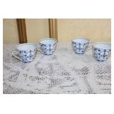 Collection of Blue and White Porcelain Tea Cups and Plates with Platters
