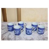 Collection of Blue and White Porcelain Tea Cups and Plates with Platters