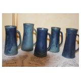 Handmade Pottery Set with Pitchers, Plates, and Crock