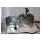 Collection of Vintage Metal Kitchen Tools including Pasta Maker, Meat Grinder, and Food Slicer
