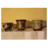 Collection of 13 Handcrafted Pottery Mugs Including Tonala Mexico and Studio Art Pieces
