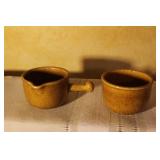 Assorted Ceramic Tableware Including Pitchers, Cups, Plates, Salt and Pepper Shakers