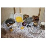 Large Kitchenware Collection with Strainers, Scales, Bowls, Baskets, and Tools