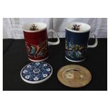 European Ceramic Tableware Lot Including Mugs, Coasters, Vases, and Tray