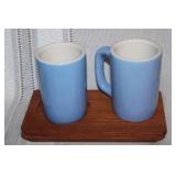 Vintage Hall Blue Mugs with Wooden Holders and Decorative Stone Heart