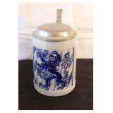 Collection of Ceramic Steins, Miniature Pottery, and Candle Holders