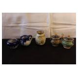 Collection of Ceramic Steins, Miniature Pottery, and Candle Holders