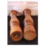 Kitchenware Collection with Salt and Pepper Shakers, Wooden Mills, Ceramic Dishes, and Flower Toothpick Holder