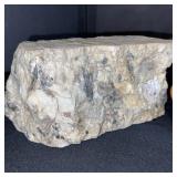 Fossil and Rock Collection with Petrified Wood and Candle