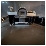 Canon AE-1 35mm Film Camera with 50mm f/1.8 FD Lens