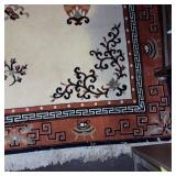Asian-Inspired Area Rug with Decorative Vases and Geometric Border