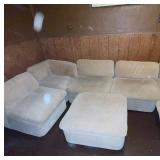 Beige Sectional Sofa with Ottoman and Chevron Pattern Upholstery