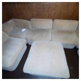 Beige Sectional Sofa with Ottoman and Chevron Pattern Upholstery