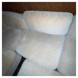 Beige Sectional Sofa with Ottoman and Chevron Pattern Upholstery