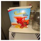 Plastic Storage Tower with Baskets, il Passatutto Velox Food Mill, and 2 Atlas Mason Jars